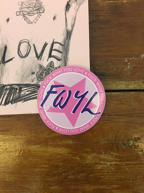 close up of fuck what you love sticker